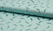 Blauwe tricot kinderstof met papegaaien in foil print