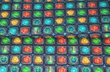 French Terry stof met 'Jewels' game thema
