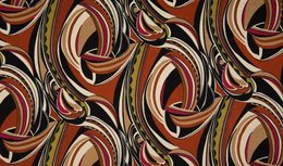 Terra rode viscose tricot stof met abstracte vormen Terra rode viscose tricot stof met abstracte vormen