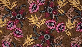 Bruin gele viscose tricot stof met bladeren en bloemen Bruin gele viscose tricot stof met bladeren en bloemen