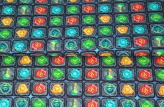 French Terry stof met 'Jewels' game thema French Terry stof met 'Jewels' game thema