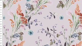 Zacht lila tricot stof met wilde bloemen Zacht lila tricot stof met wilde bloemen